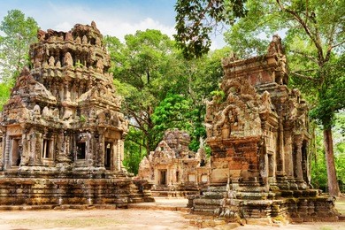 view of buildings leading to central sanctuary of ancient thommanon temple in amazing angkor, siem reap, cambodia. mysterious thommanon nestled among rainforest. angkor is popular tourist attraction