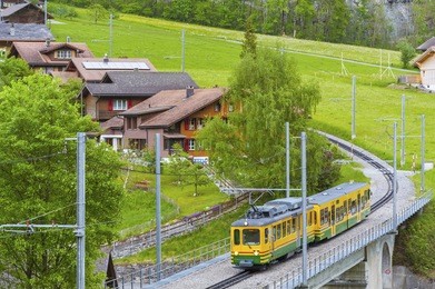 train in lauterbrunnen valley, switzerland