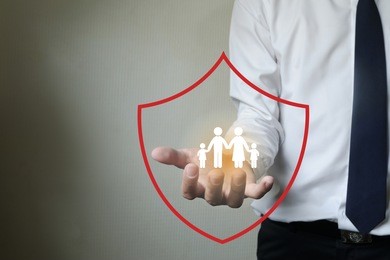 business man  protecting family, insurance concept