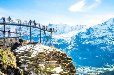 steel catwalk over snowy alps  round the first top station above grindelwald, switzerland.