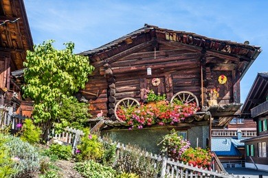 wood chalet in mountain village murren at jungfrau region, switzerland.