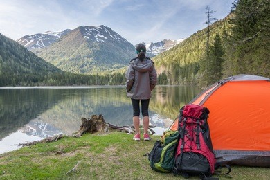 camp in the mountains near of the lake. bivouac on the lake in the alps