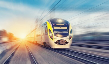 modern high speed train on a clear day with motion blur