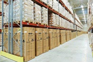 interior of modern warehouse. rows of shelves with boxes