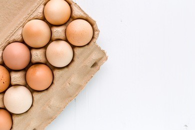 fresh eggs on white background