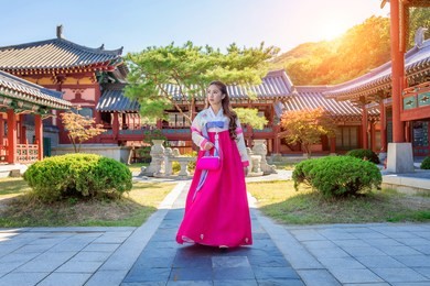 woman with hanbok in gyeongbokgung,the traditional korean dress.