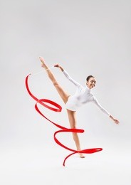 young gymnast with tape in the studio