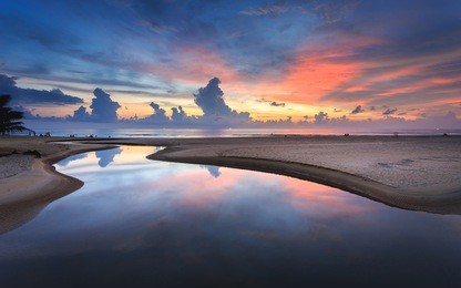 beautiful sunset at karon beach in phuket, thailand