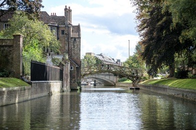 mathematical bridge autumn scenic view of mathematical bridge over cam river next to presidents lodge, cambridge, england