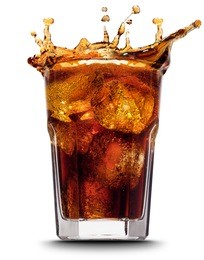 ice cube droped in cola glass and cola splashing