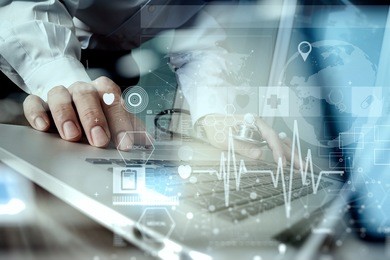 doctor working at workspace with laptop computer and medical digital network media diagram in  office