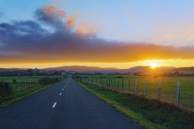 country road to unza at the sunset