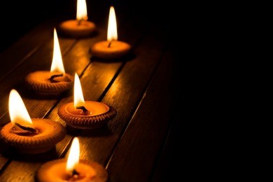 still life candle light on wood plate