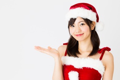 portrait of young asian woman wearing santa costume