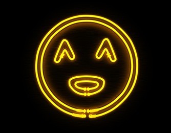 smiley face 3d render yellow neon icon on black background