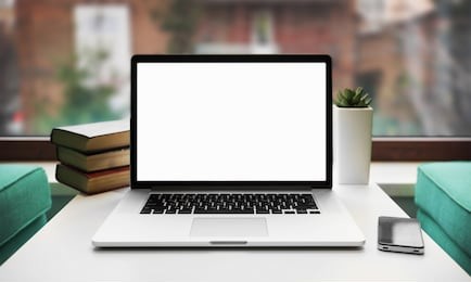 laptop and other electronics  on workspace