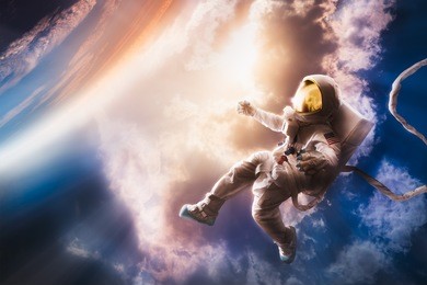 astronaut floating in the stratosphere near a planet
