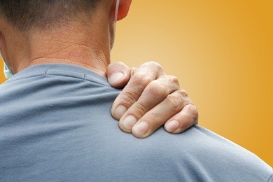 old man with shoulder pain