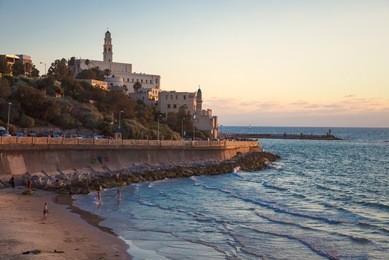 view of the old port in tel aviv at sunset