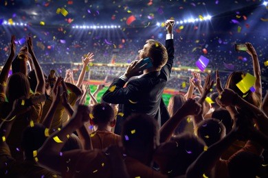 fans on stadium game businessman