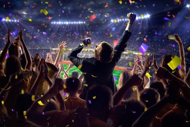 fans on stadium game businessman