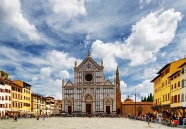view of the basilica di santa croce (basilica of the holy cross) on square of the same name in florence, tuscany, italy. florence is a popular tourist destination of europe.