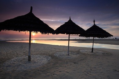 t20, t18, my khe beach, danang, da nang, vietnam in the sunrise. you can enjoy the han river, son tra mountain, beautiful beach in the heart of this beautiful city. 30 km far away from hoi an.