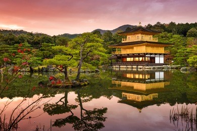 kyoto, japan at the golden pavilion at dusk.