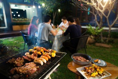 dinner party, barbecue and roast pork at night