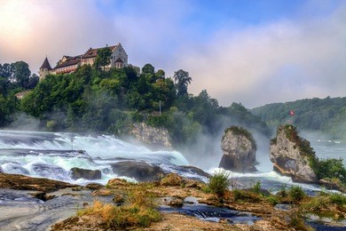 rhinefalls in the grey morning fog, switzerland