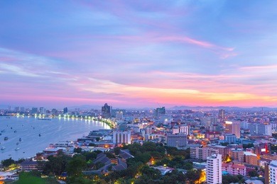 the building and skyscrapers in twilight time in pattaya,thailand. pattaya city is famous about sea sport and night life entertainment.
