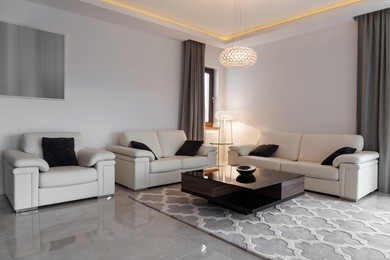white leather furniture in elegant modern lounge