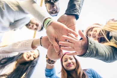 group of people supporting each others. concept about team work and friendship