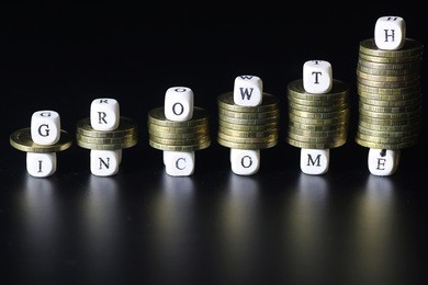 growth income text letter stack coin