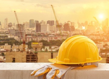 yellow hard hat on construction site