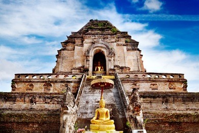 ancient temple of wat chedi luang in chiang mai, thailand. trip to asia, golden buddha.
