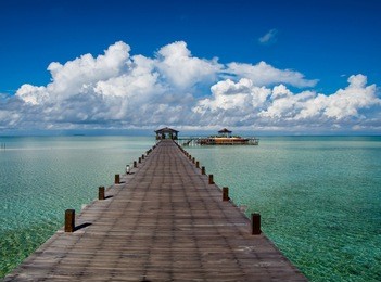 a man-made walkway of kapalai island exotic tropical resort