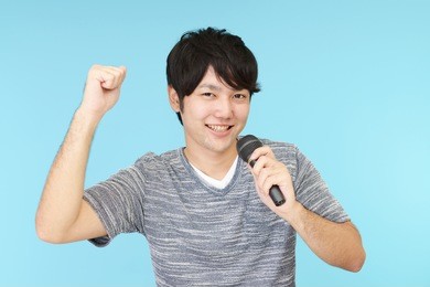 man singing karaoke