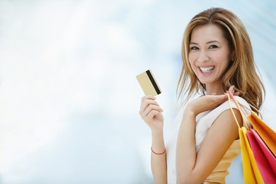 beautiful young girl with credit card