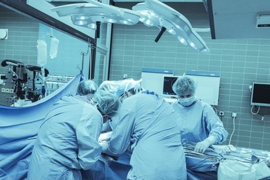 surgical team in a cancer removal operation in surgery environment