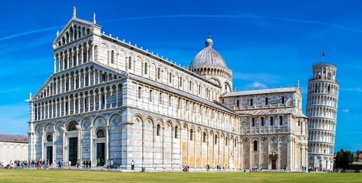 leaning tower and pisa cathedral in a summer day in pisa, italy