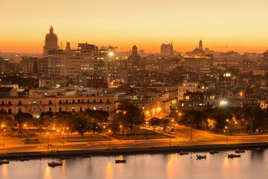 sunset in old havana with a view of  the bay and the capitol building