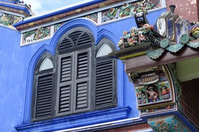 penang, malaysia - nov 26, 2015:  old historical chinese influence mansion, fatt tze mansion or blue mansion, famous oriental historical building in georgetown, penang, malaysia