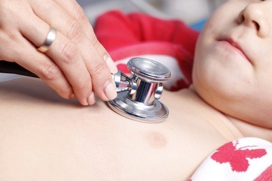 a young woman doctor cardiologist makes a survey