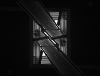 double exposure closeup of contemporary interior detail. black and white image of modern architecture in darkness. 