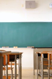 school classroom with school desks and blackboard in japanese high school