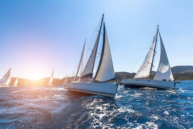 luxury yachts at sailing regatta. sailing in the wind through the waves at the sea. 
