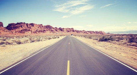 vintage toned photo of an endless road.
