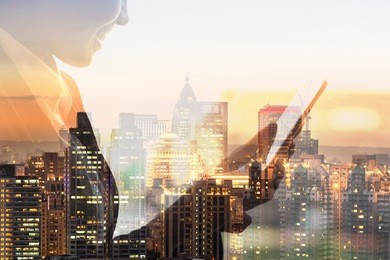 portrait of asian business woman using tablet in a room, concept of technology or communication.