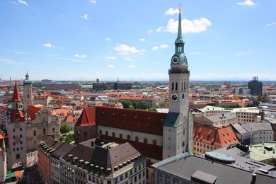 cityscape of munich, bavaria, germany seen from the top of city hall. prominent church - peterskirche.